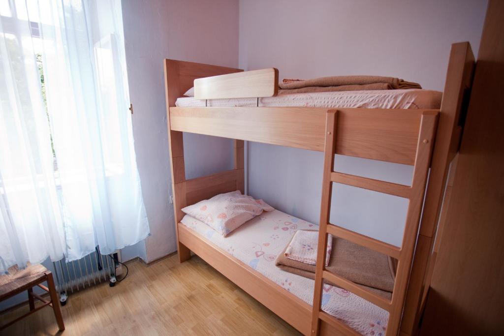 Postel nebo postele na pokoji v ubytování HI Hostel Pula