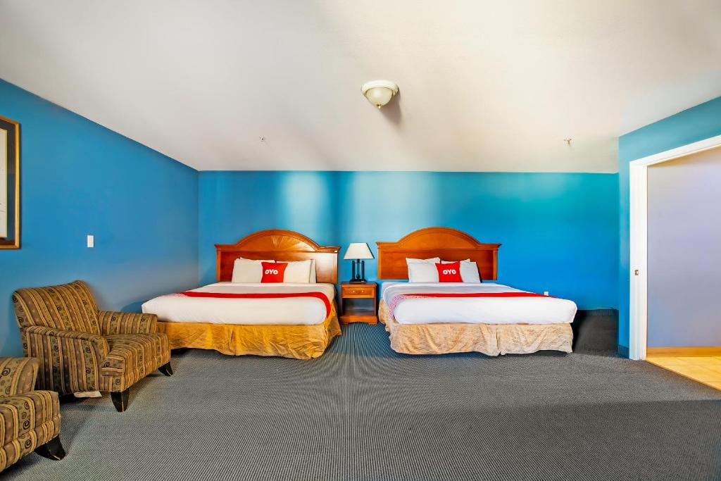 Postel nebo postele na pokoji v ubytování OYO Hotel Jacksboro TX - Fort Richardson