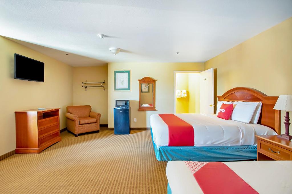 Postel nebo postele na pokoji v ubytování OYO Hotel Jacksboro TX - Fort Richardson