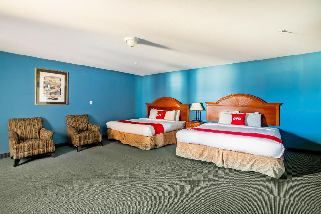 Postel nebo postele na pokoji v ubytování OYO Hotel Jacksboro TX - Fort Richardson