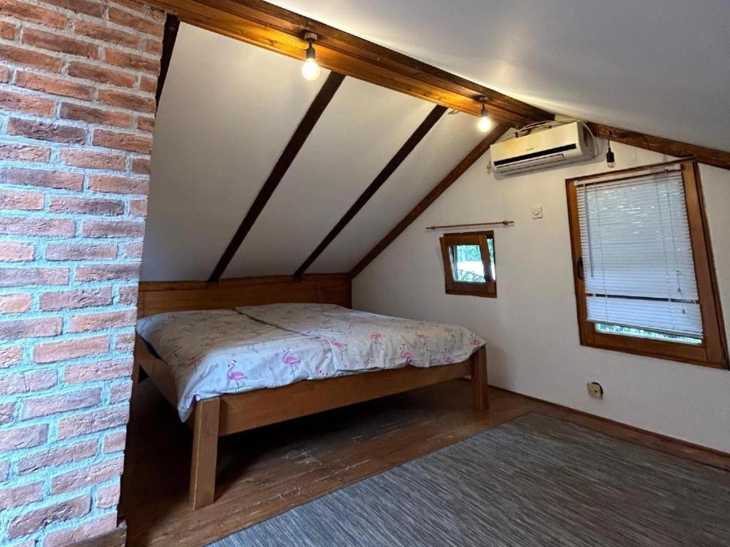 Ένα ή περισσότερα κρεβάτια σε δωμάτιο στο House apartment Baby L - near the Railway Station