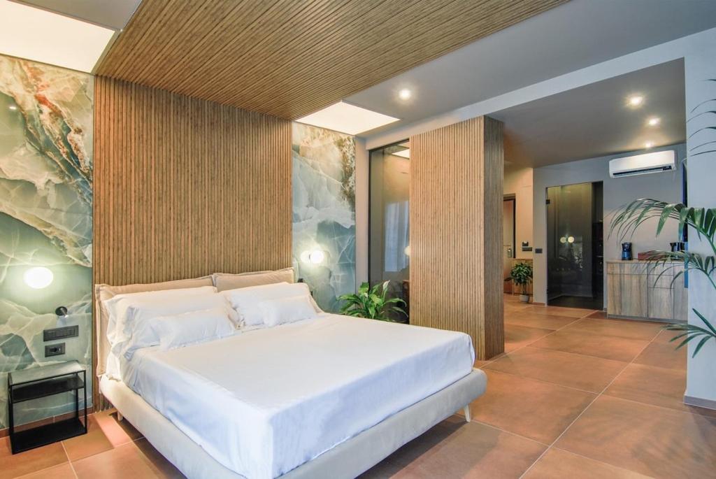 Letto o letti in una camera di Le Dimore - Ponte 7