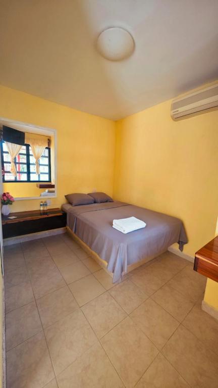 Postel nebo postele na pokoji v ubytování Hotel Mirador Maya Calakmul