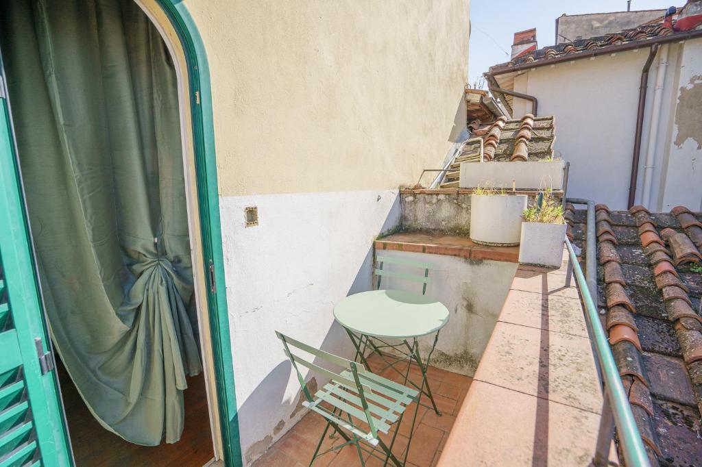A balcony or terrace at Pretty Apartment Alfani