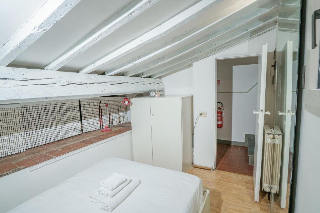 A bed or beds in a room at Pretty Apartment Alfani