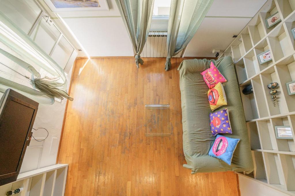 A television and/or entertainment centre at Pretty Apartment Alfani