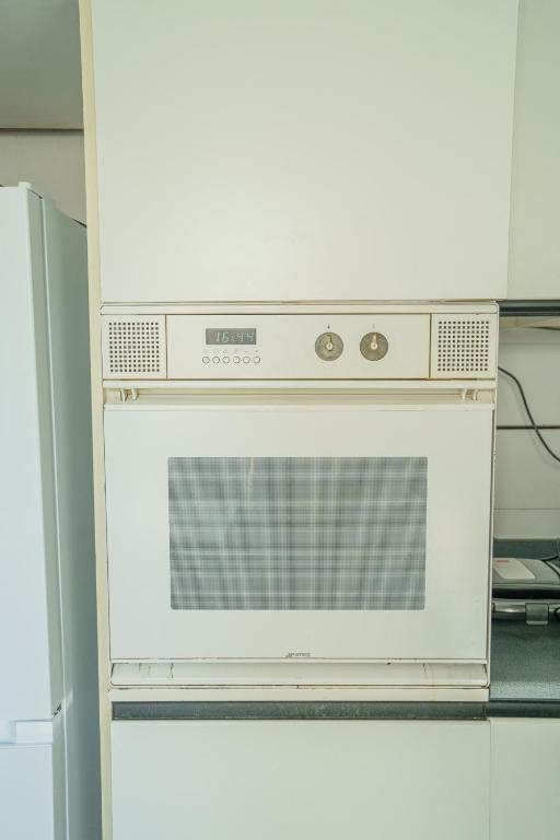 A kitchen or kitchenette at Pretty Apartment Alfani