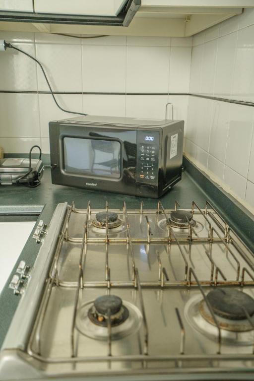 A kitchen or kitchenette at Pretty Apartment Alfani