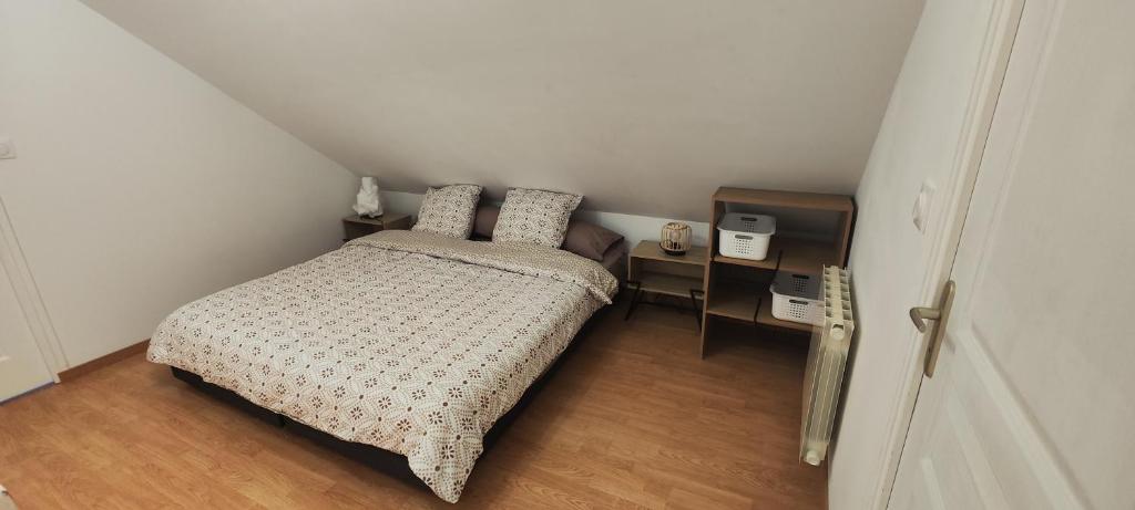 Postel nebo postele na pokoji v ubytování Gîte fleur du paradis
