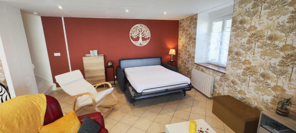 Postel nebo postele na pokoji v ubytování Gîte fleur du paradis