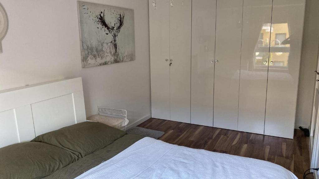 Postel nebo postele na pokoji v ubytování Apartament Tuwima