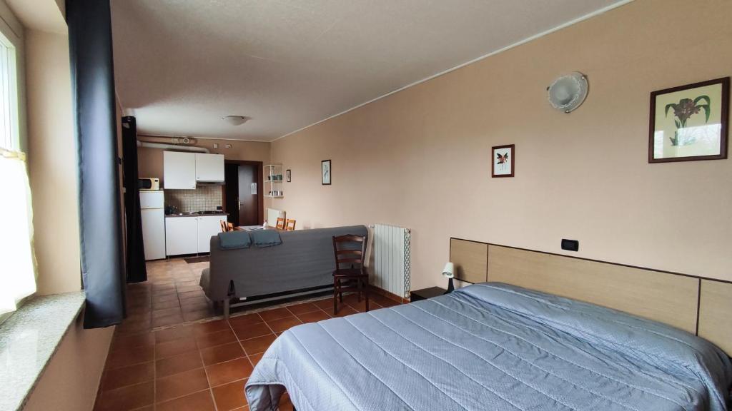 Postel nebo postele na pokoji v ubytování La Vecchia Cantina