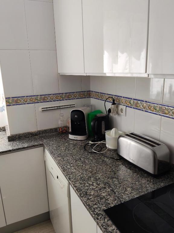 A kitchen or kitchenette at Relax en la playa