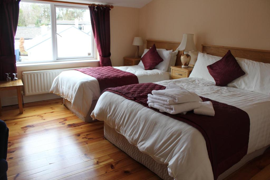Postel nebo postele na pokoji v ubytování Carrowntober House B & B