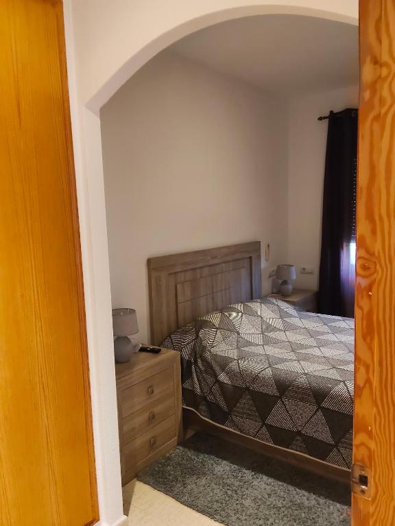 A bed or beds in a room at Relax en la playa