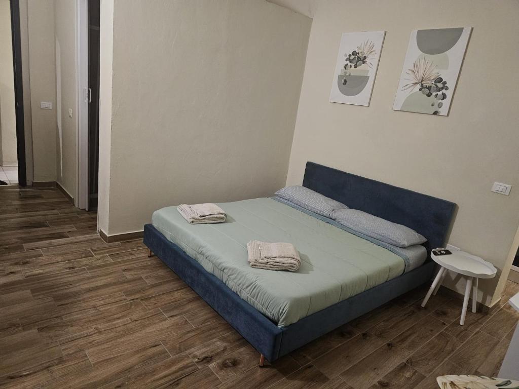 Postel nebo postele na pokoji v ubytování Dolce Dormire