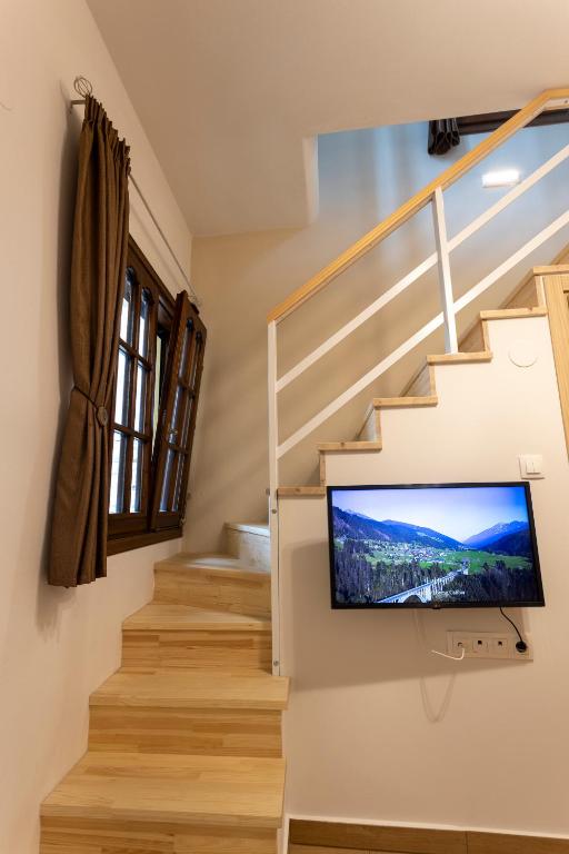TV a/nebo společenská místnost v ubytování The Arch Nest