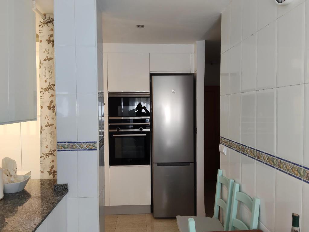 A kitchen or kitchenette at Relax en la playa