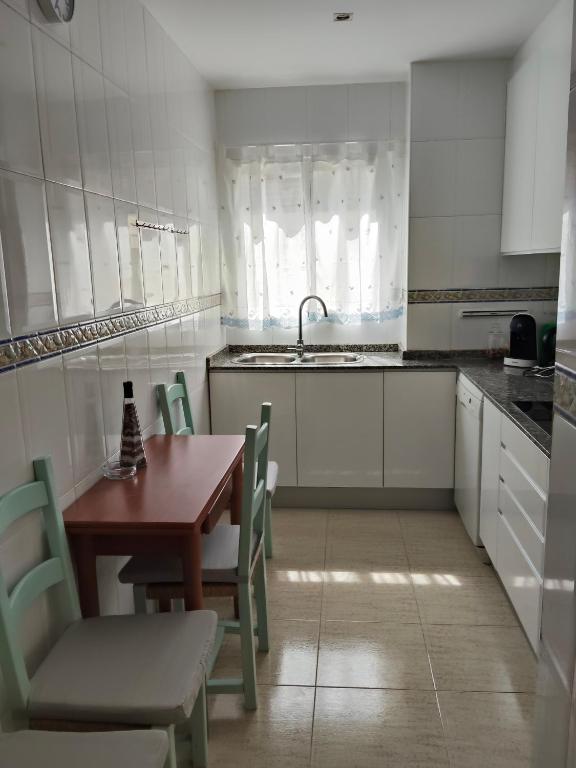 A kitchen or kitchenette at Relax en la playa
