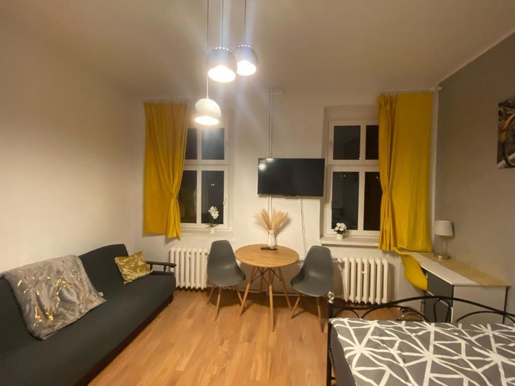 Posezení v ubytování Magnolia Rooms Plus