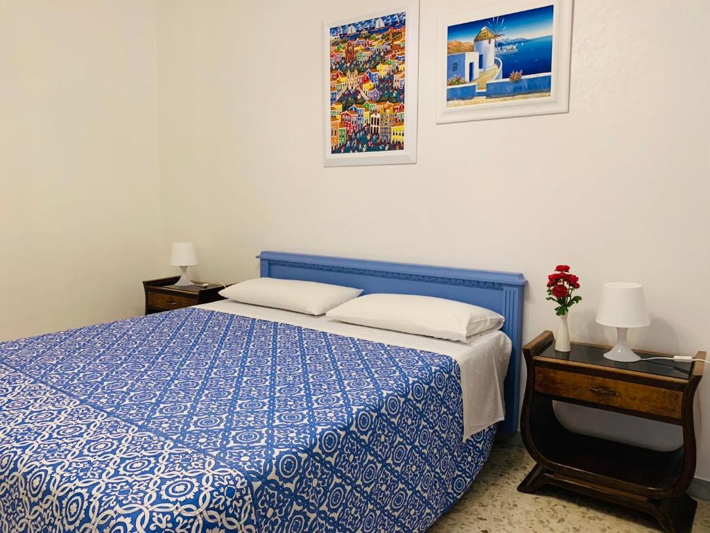 Katil atau katil-katil dalam bilik di Radici Apartment Locazione turistica
