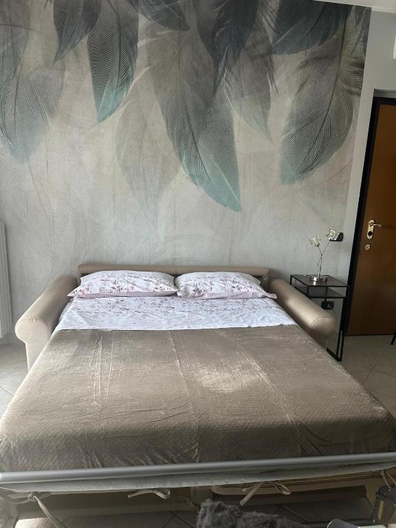 Postel nebo postele na pokoji v ubytování NoemiHouse