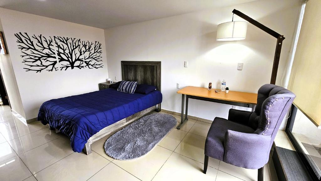 Ένα ή περισσότερα κρεβάτια σε δωμάτιο στο C3 EXECUTIVE SUITES at ITESM CEM Families Tourists & Travelers Choice Foreign Students Companies Executives WELCOME!!! 10min Izcalli-15min Esmeralda-20min Sátelite-25min AIFA