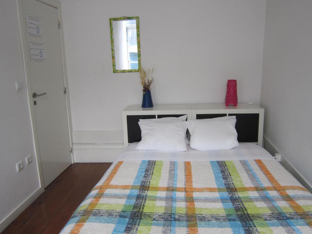 Postel nebo postele na pokoji v ubytování Hostel Prime Guimaraes