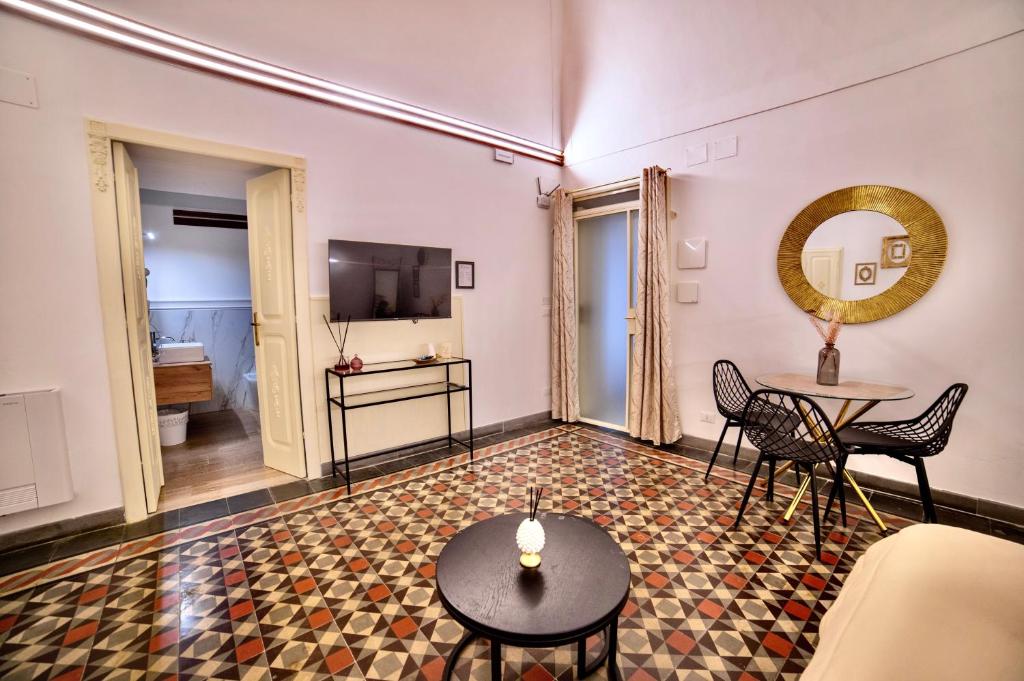 TV a/nebo společenská místnost v ubytování La Corte rooms