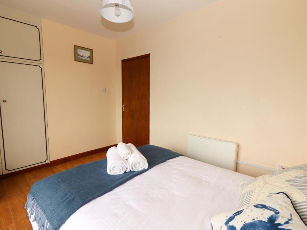 Postel nebo postele na pokoji v ubytování Barr na hAille