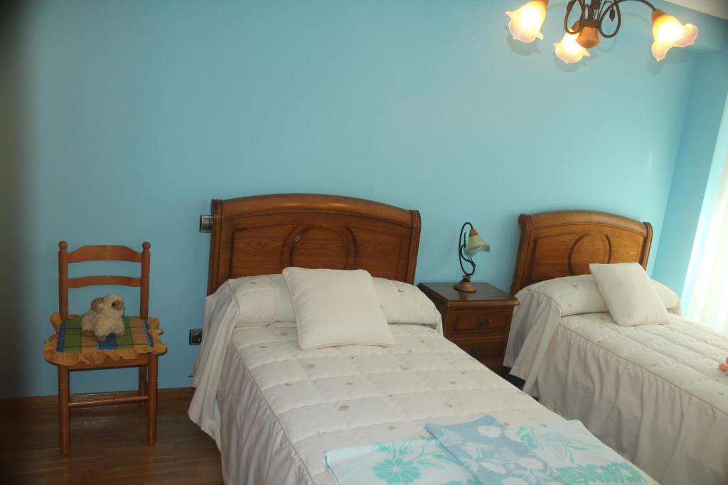 Postel nebo postele na pokoji v ubytování Casa Luis