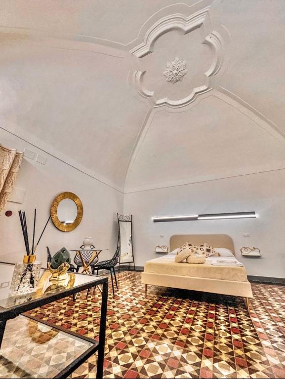 Postel nebo postele na pokoji v ubytování La Corte rooms