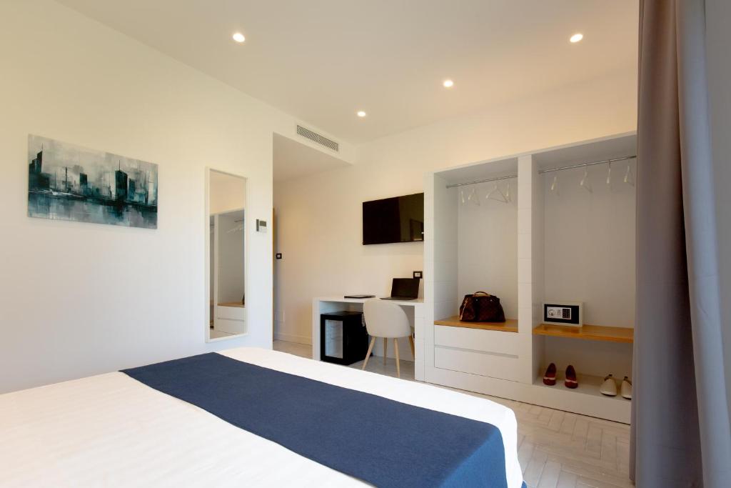 Postel nebo postele na pokoji v ubytování Gioì Hotel Sorrento