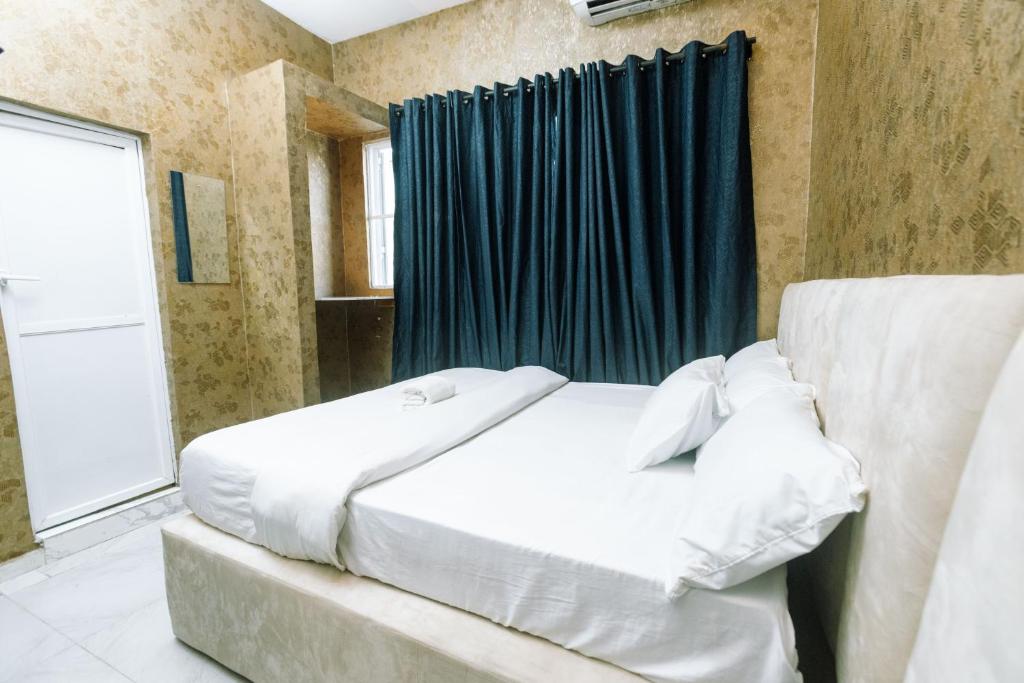 Postel nebo postele na pokoji v ubytování Clazz Hotel