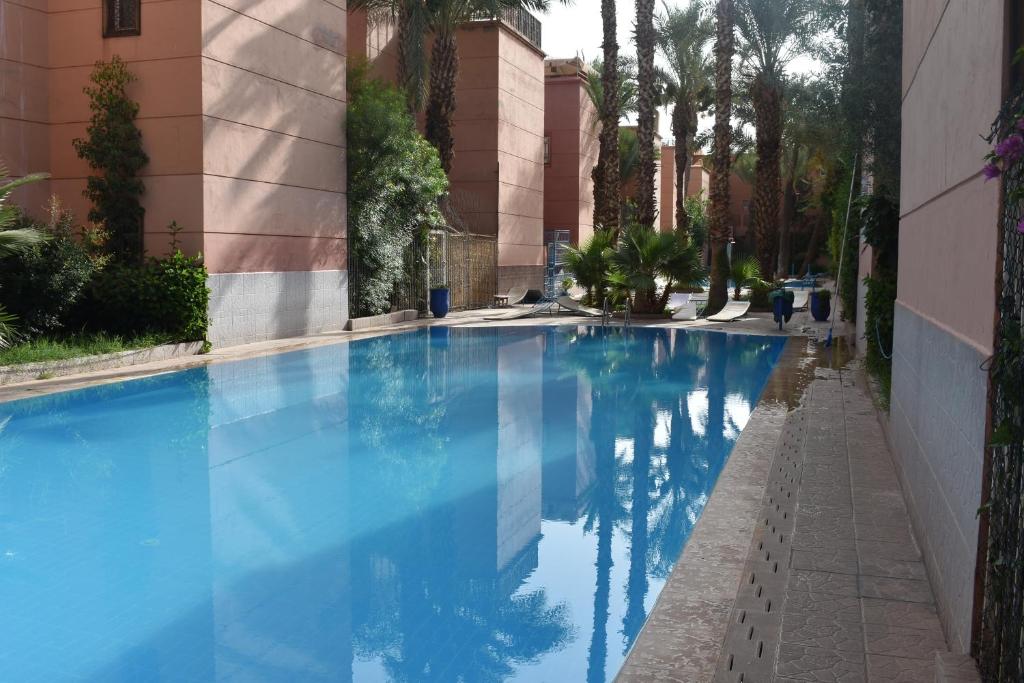 Bazén v ubytování Riad butterfly Marrakech nebo v jeho okolí