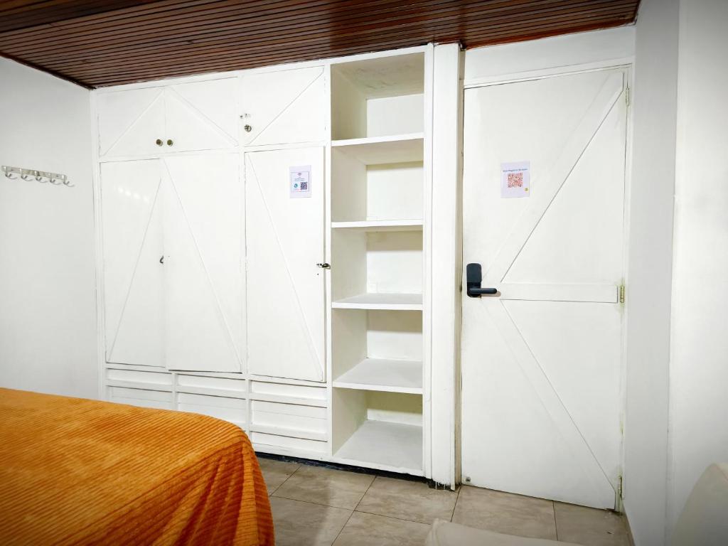 Postel nebo postele na pokoji v ubytování Ayllu Hostel