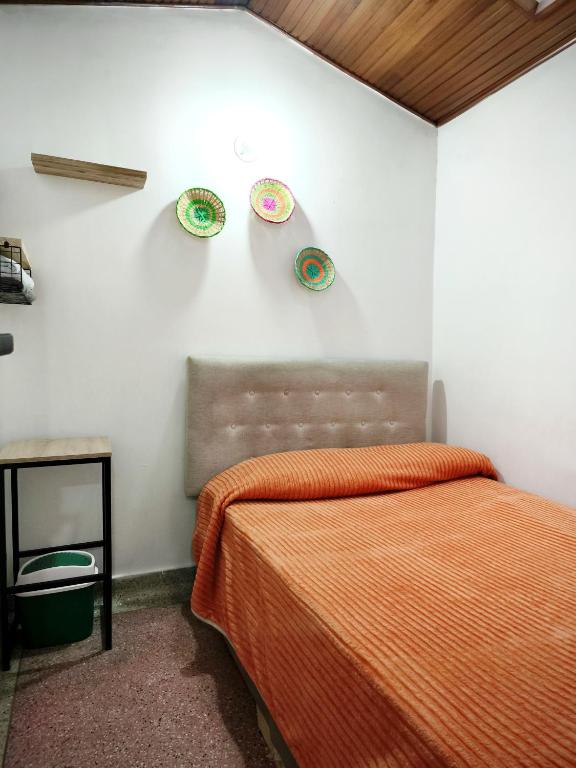 Postel nebo postele na pokoji v ubytování Ayllu Hostel