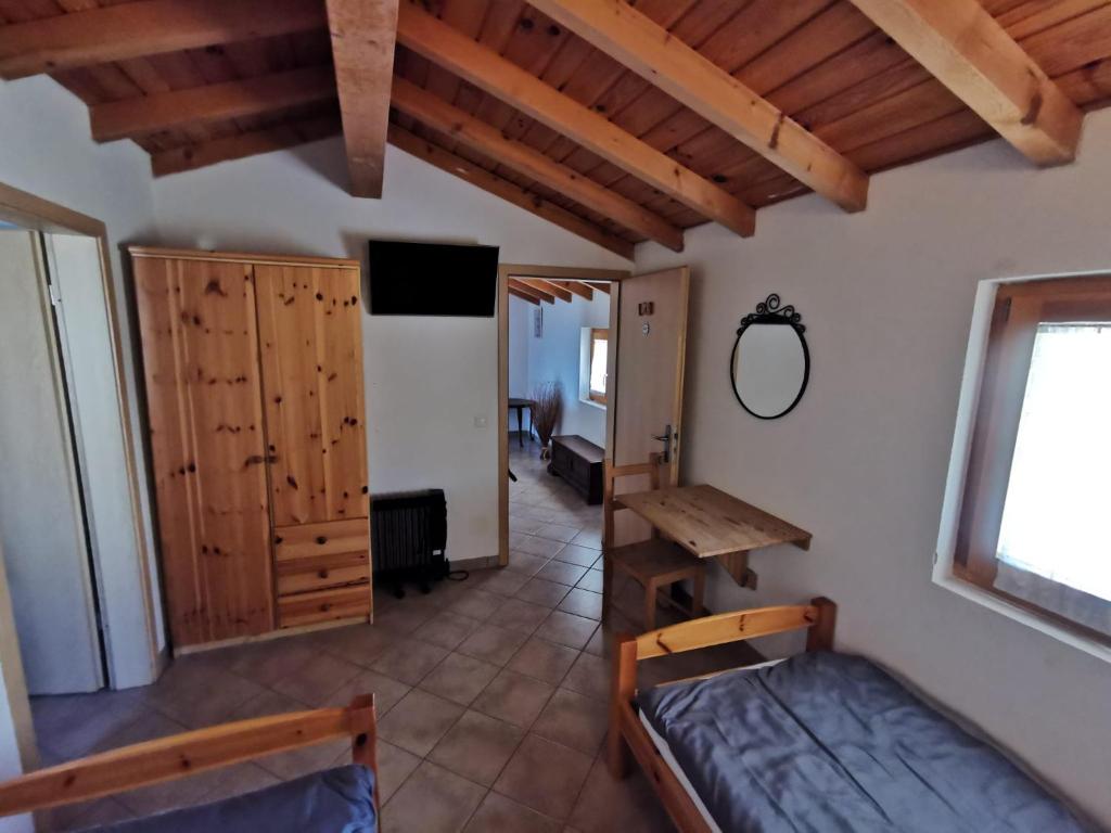 Postel nebo postele na pokoji v ubytování La Pagliera