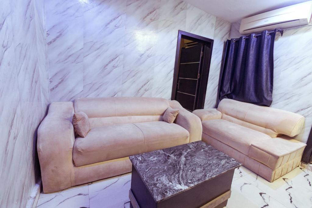 Posezení v ubytování Clazz Hotel