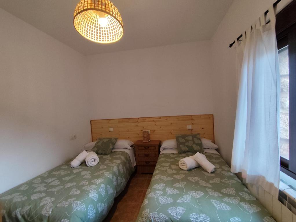 Postel nebo postele na pokoji v ubytování CR La Carrasca