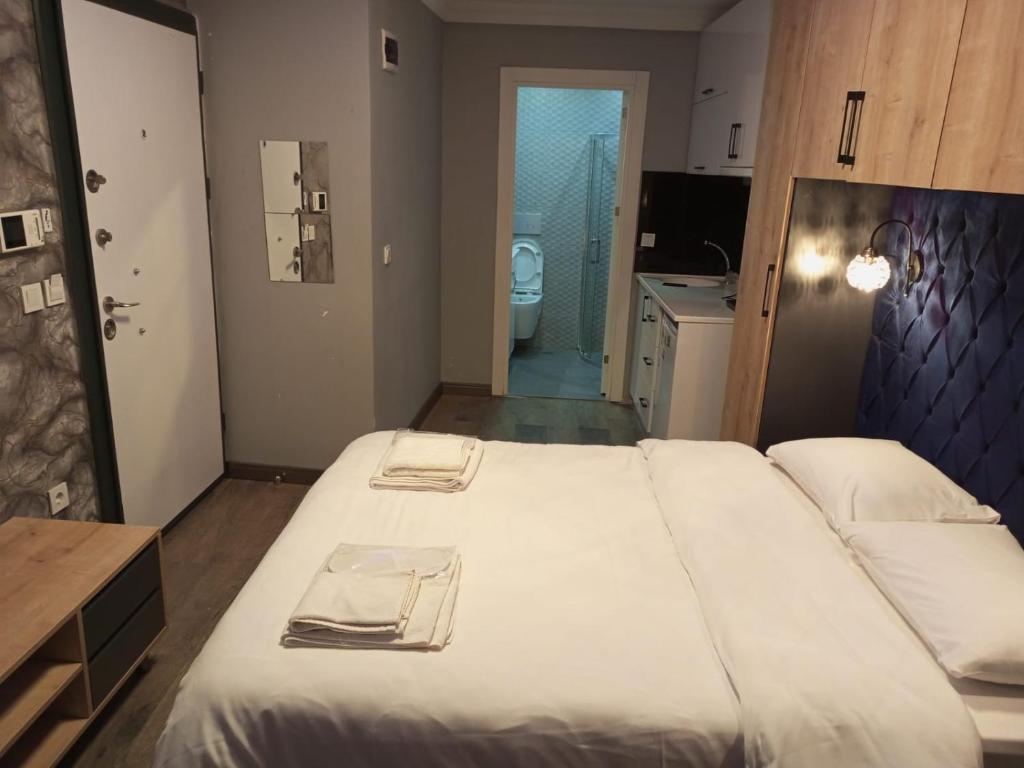 Postel nebo postele na pokoji v ubytování Middle Village