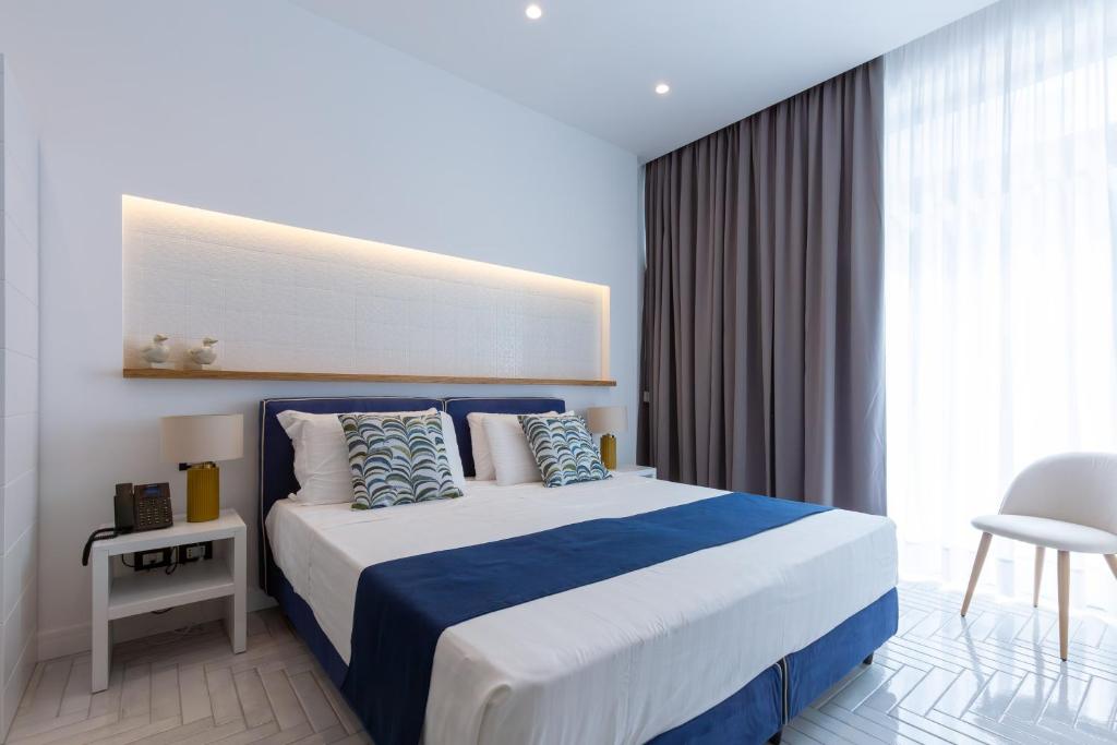 Postel nebo postele na pokoji v ubytování Gioì Hotel Sorrento