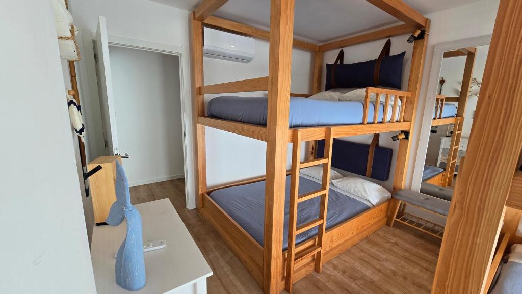 Postel nebo postele na pokoji v ubytování Mil e Uma Noites