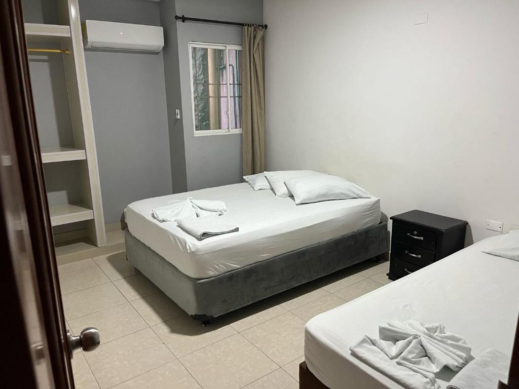 Postel nebo postele na pokoji v ubytování HOTEL BOSCONIA IMPERIAL
