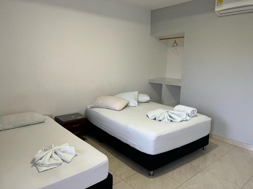 Postel nebo postele na pokoji v ubytování HOTEL BOSCONIA IMPERIAL