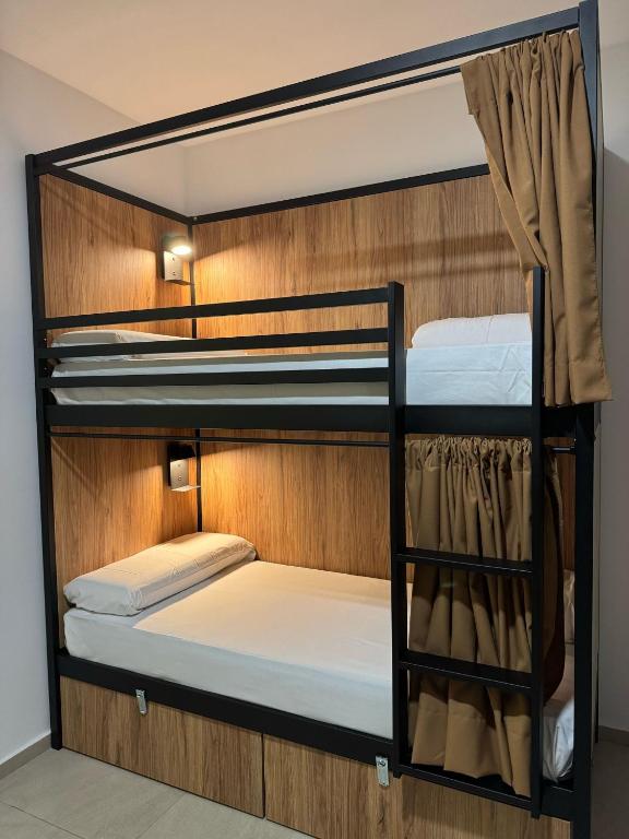 A bed or beds in a room at Hostel Welcome Benidorm