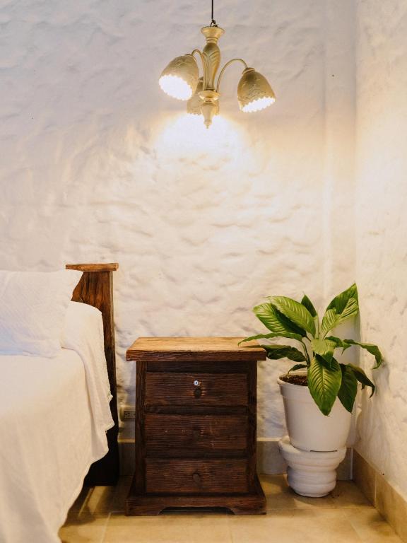 Postel nebo postele na pokoji v ubytování Hotel Kalma