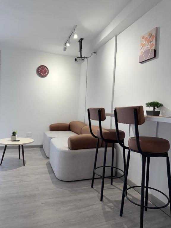 Posezení v ubytování LOFT HOST PARTNER Cerca al Aeropuerto,Expofuturo y Ukumari