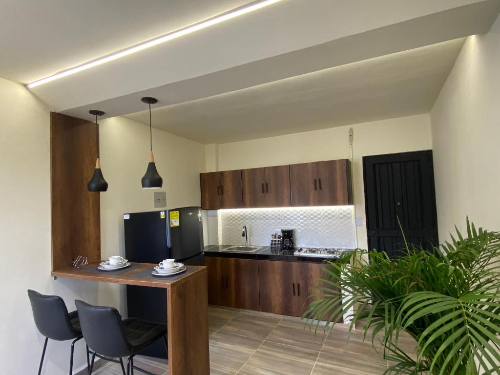 Kuchyň nebo kuchyňský kout v ubytování LOFT HOST PARTNER Cerca al Aeropuerto,Expofuturo y Ukumari