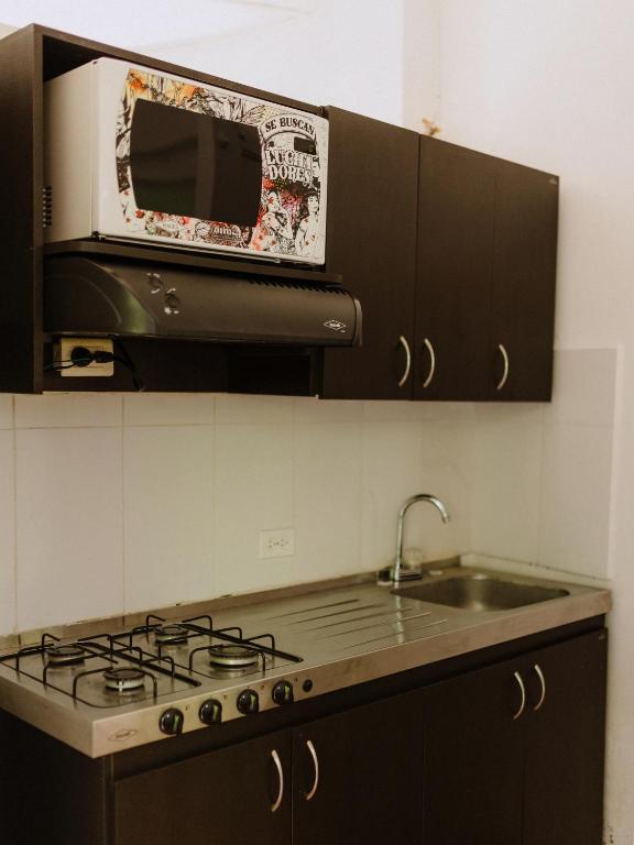 Kuchyň nebo kuchyňský kout v ubytování Hotel Kalma